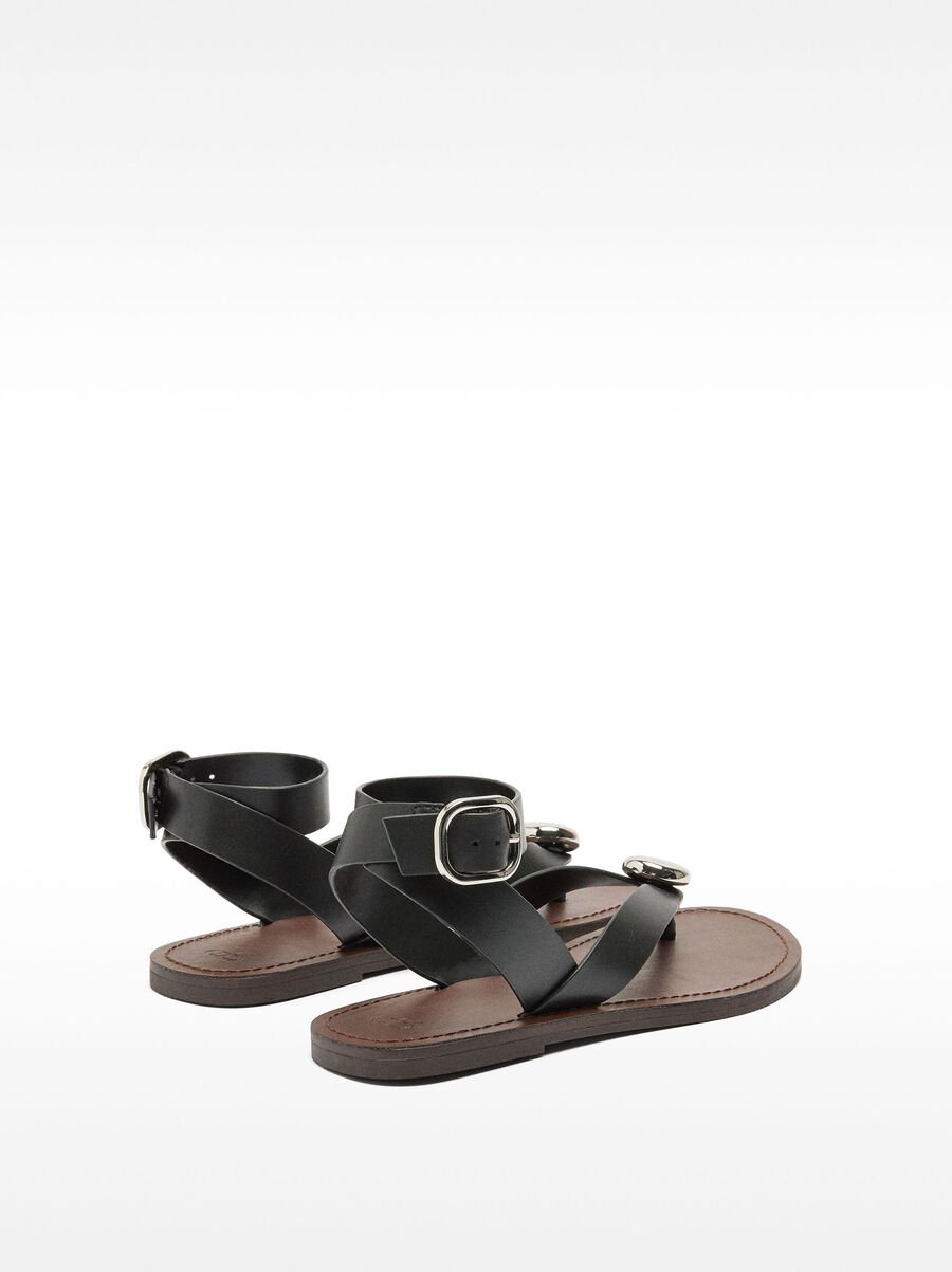 Leather flat sandals with metallic detail