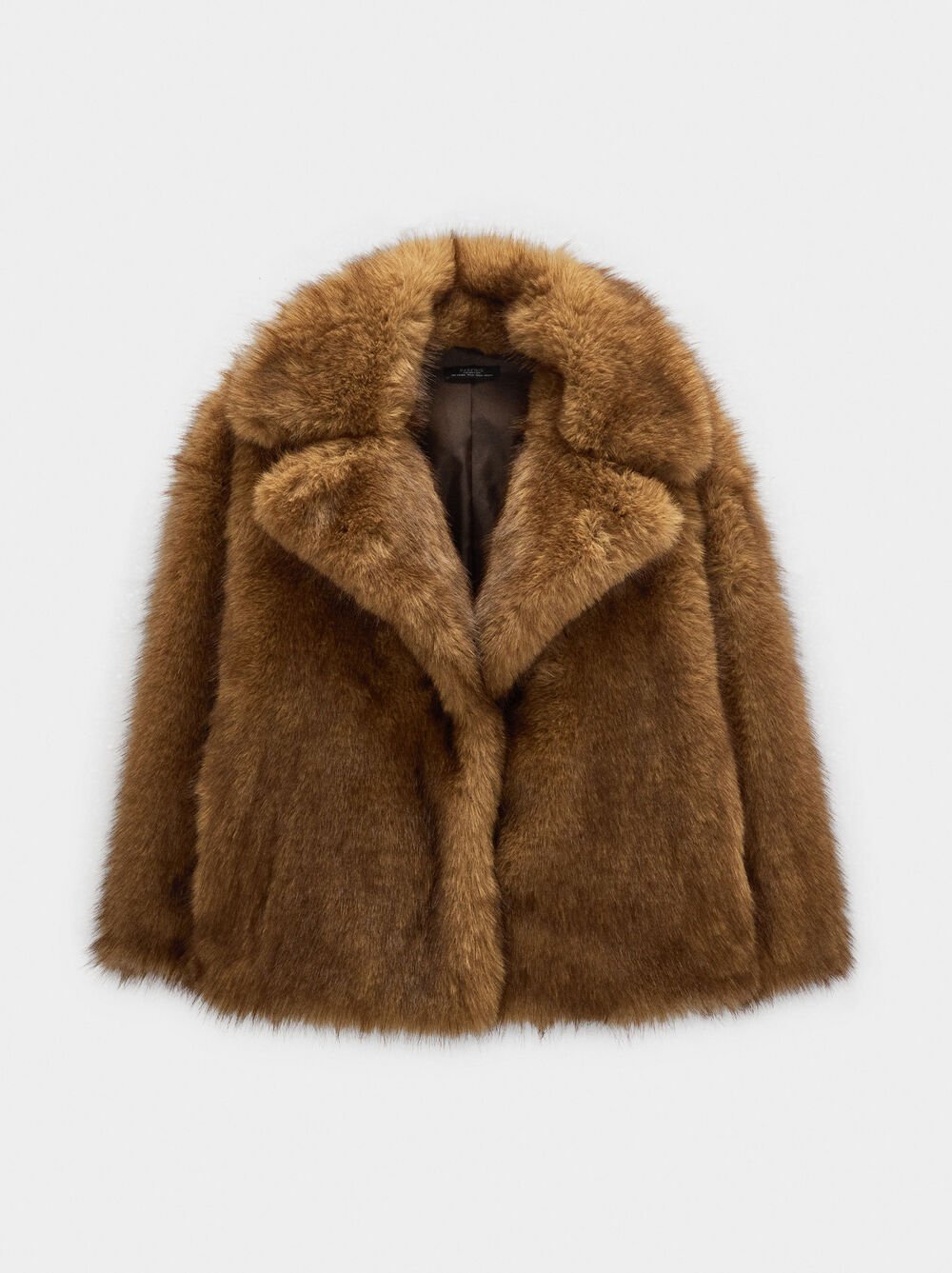 Voluminous coat with fur effect
