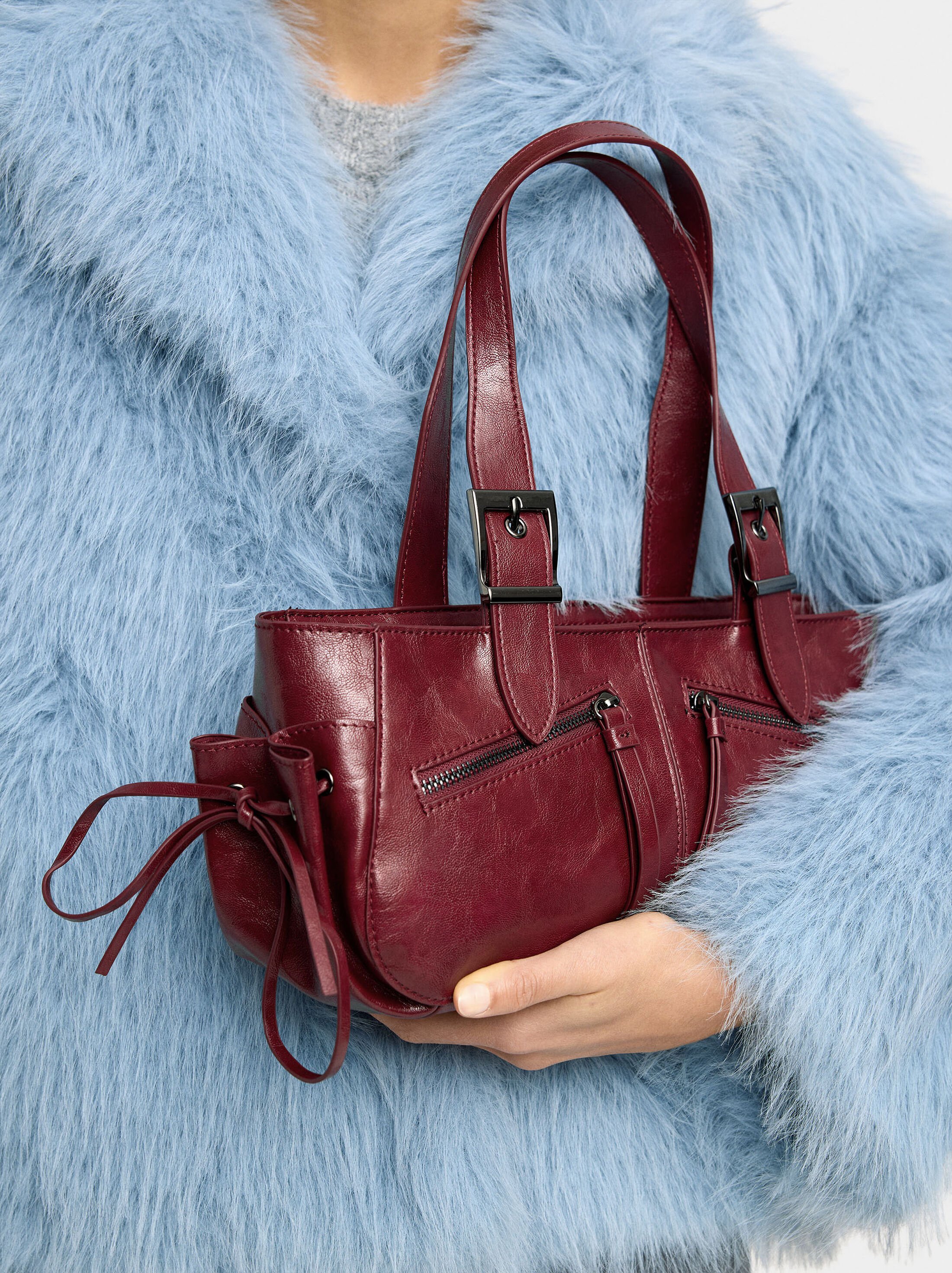 Bossa d'espatlla amb efecte craquelat image number 1.0