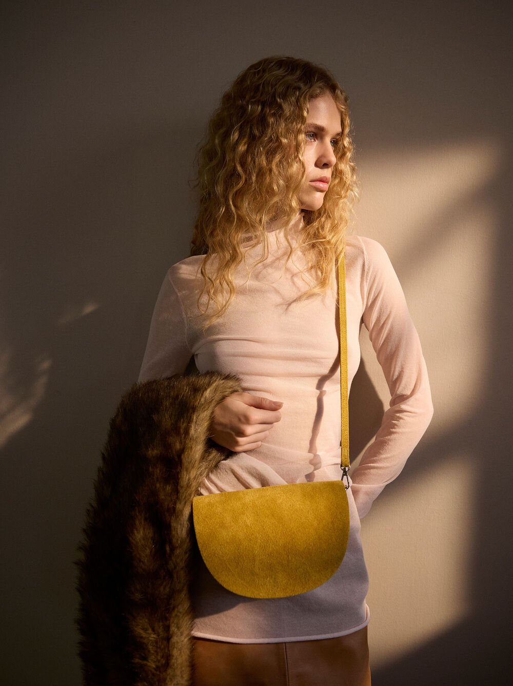Suede crossbody bag with flap