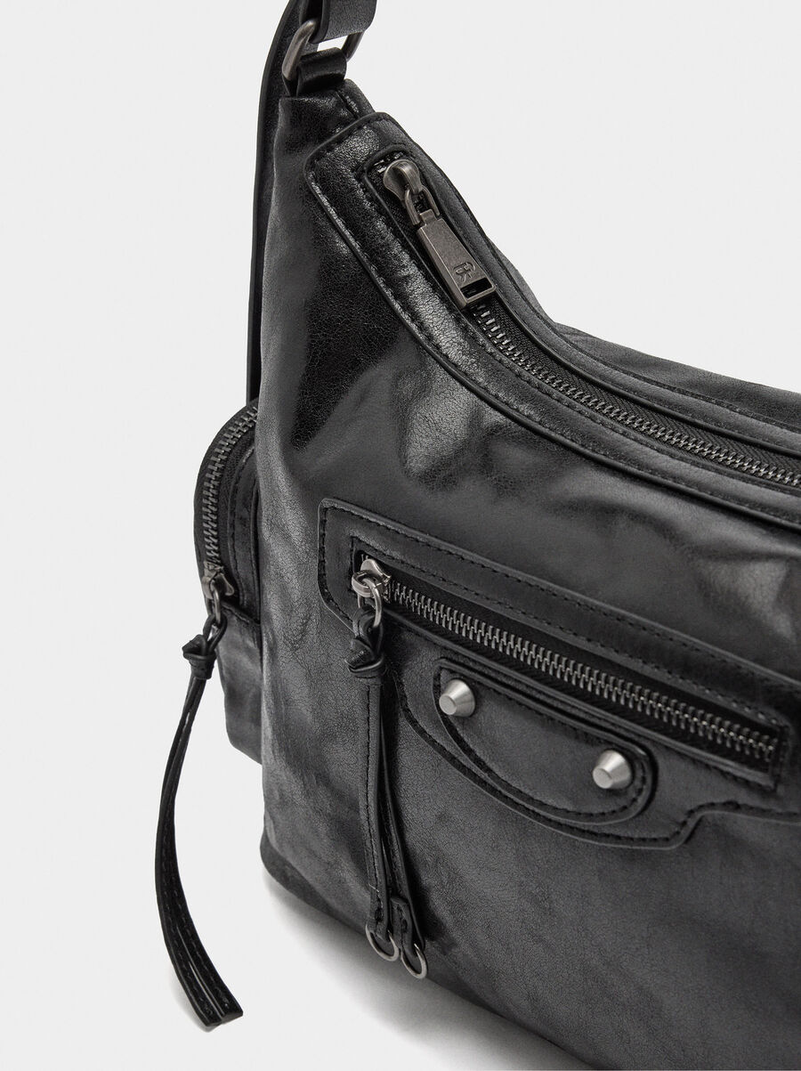 Shoulder bag with aged effect