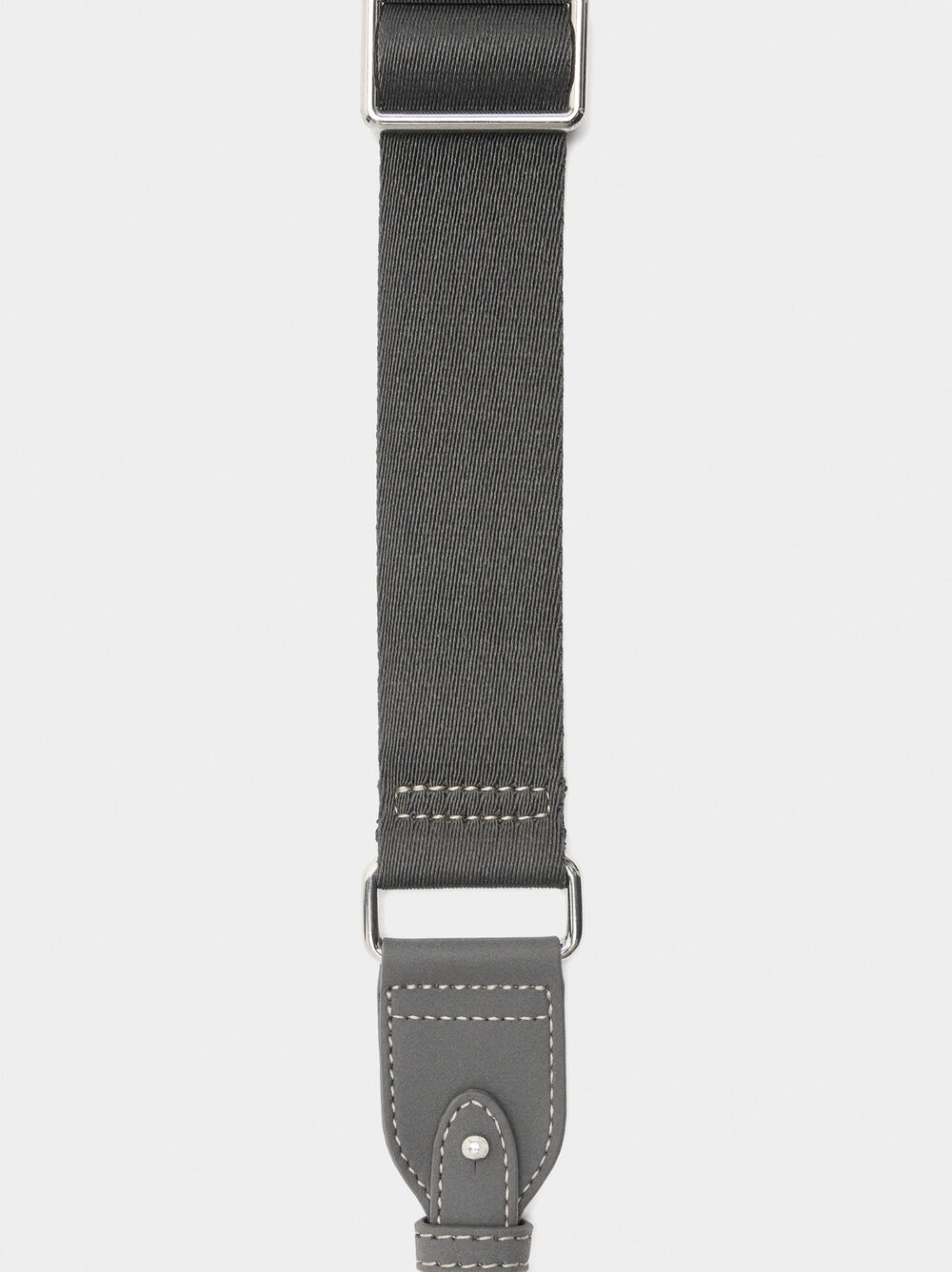 Oval crossbody bag with flap