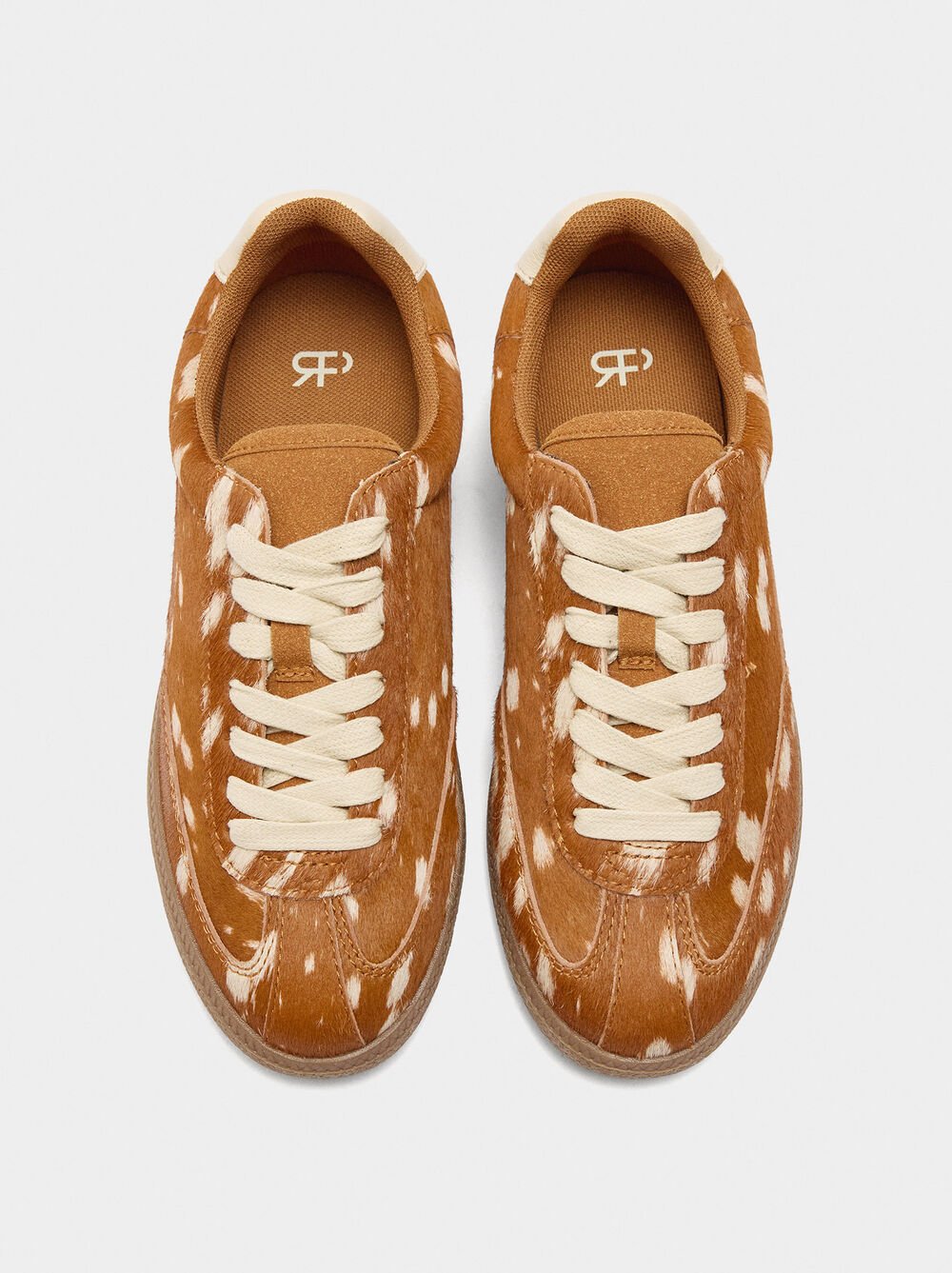 Leather sneakers with animal print