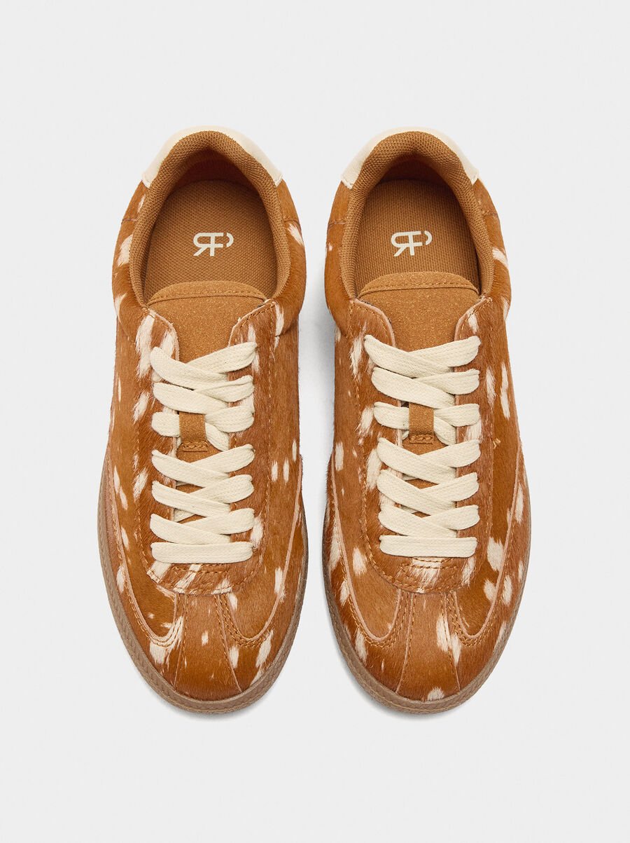 Leather sneakers with animal print