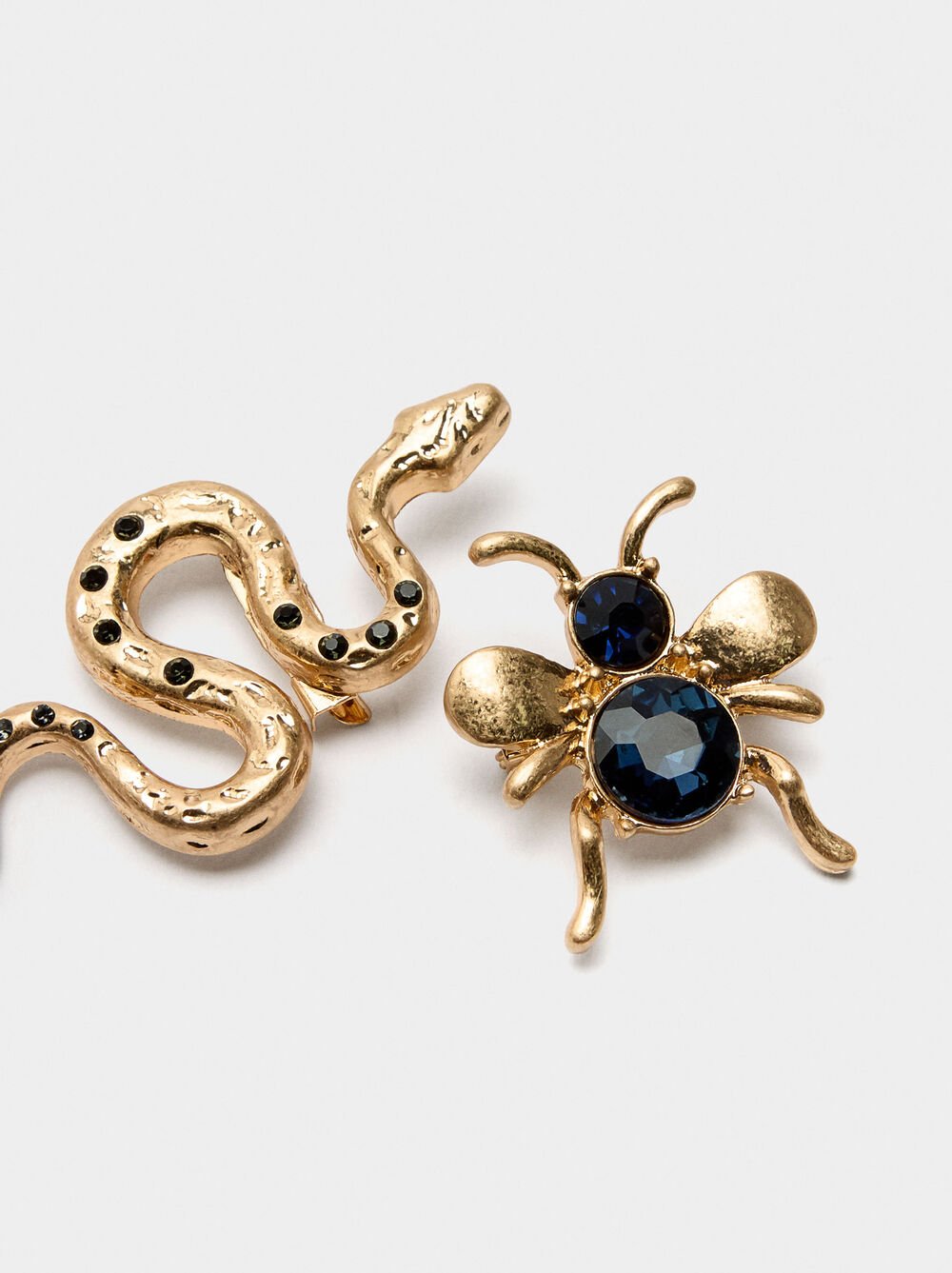 Set of brooches with bee and snake