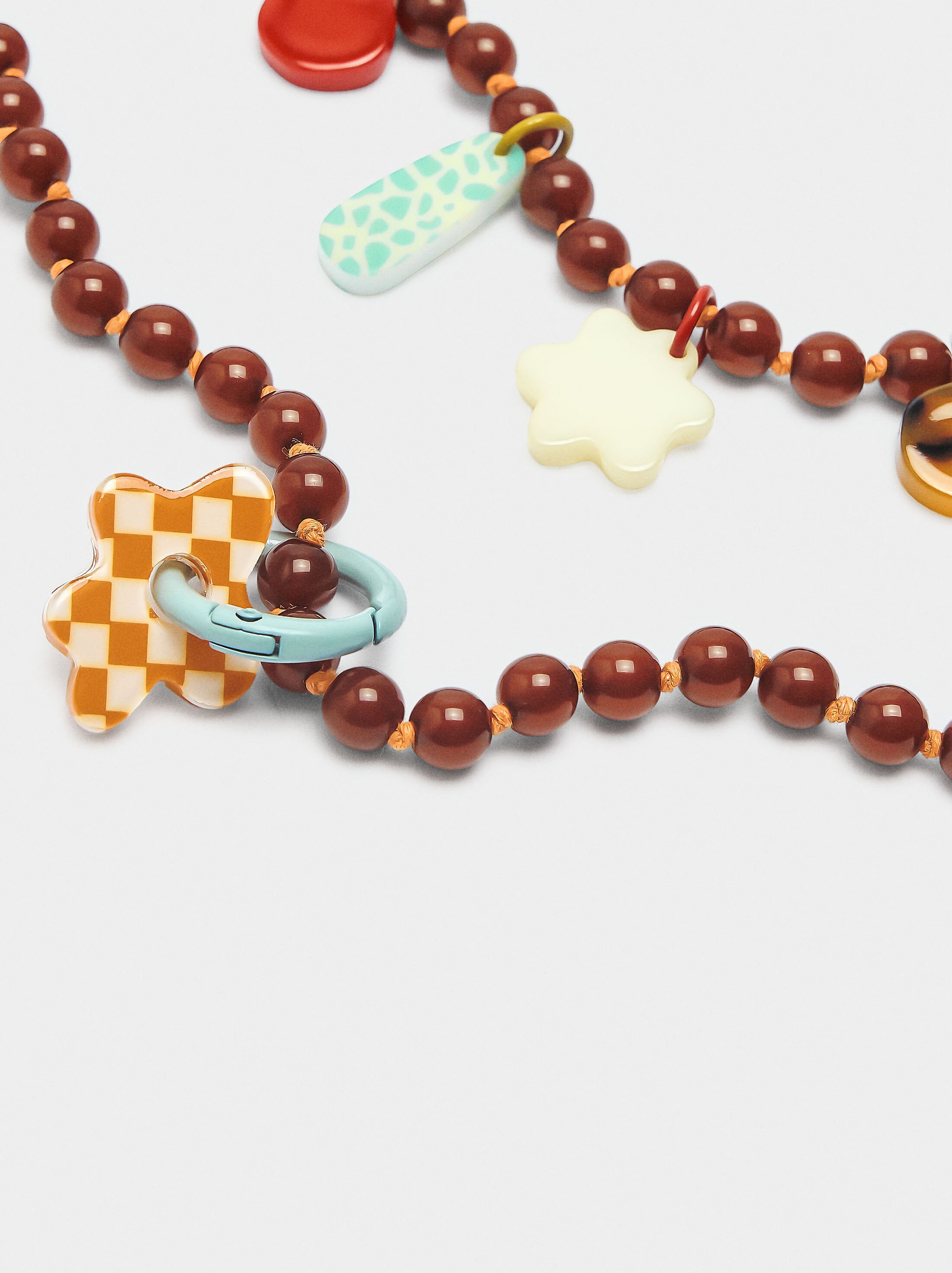Double necklace of beads with charms image number 2.0