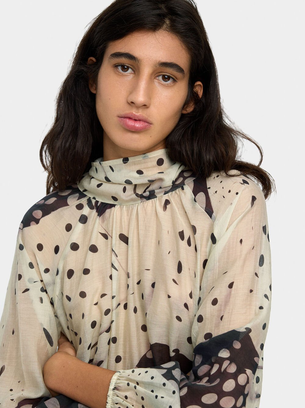 Blouse with semi-transparent print
