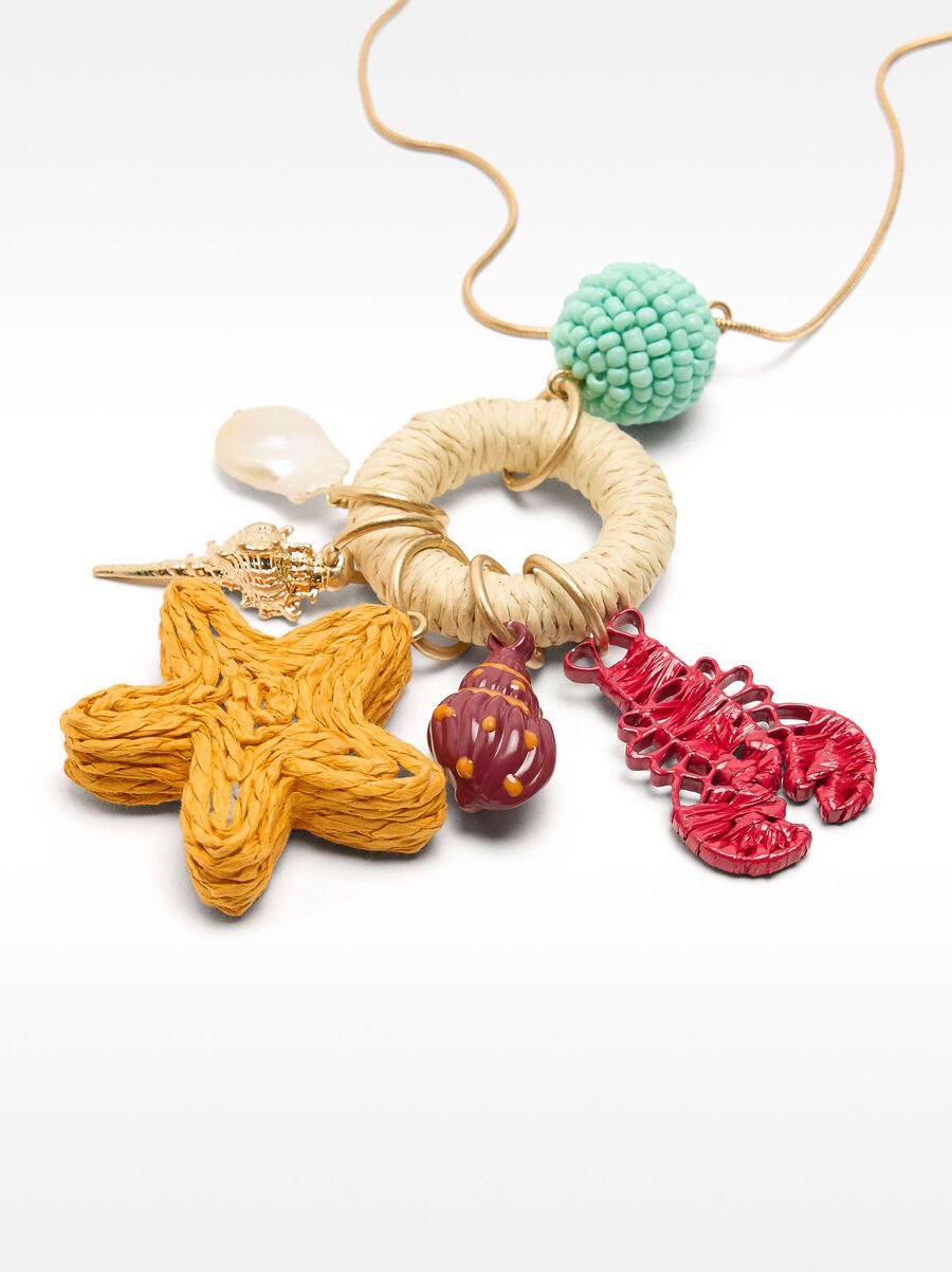 Long necklace with raffia pendants and freshwater pearl