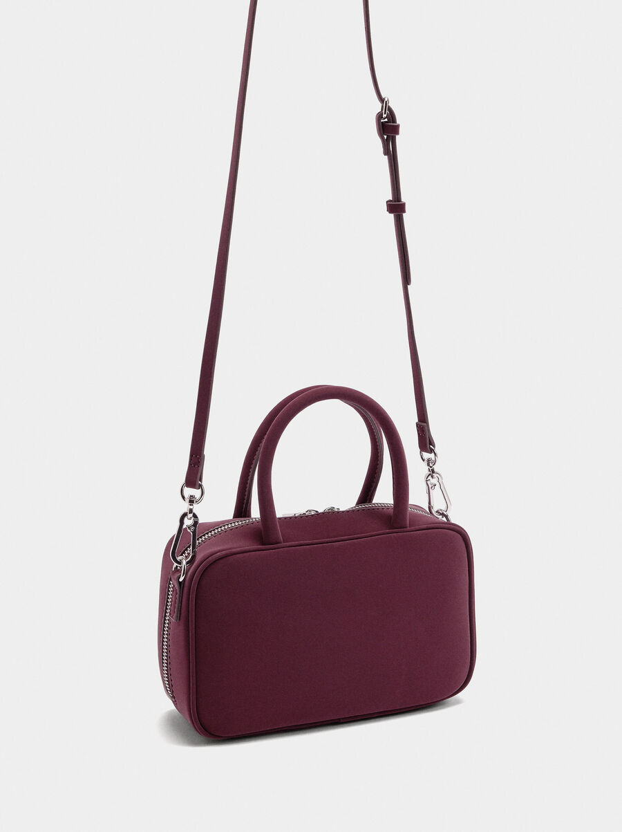 Bolso bowling de textura suave