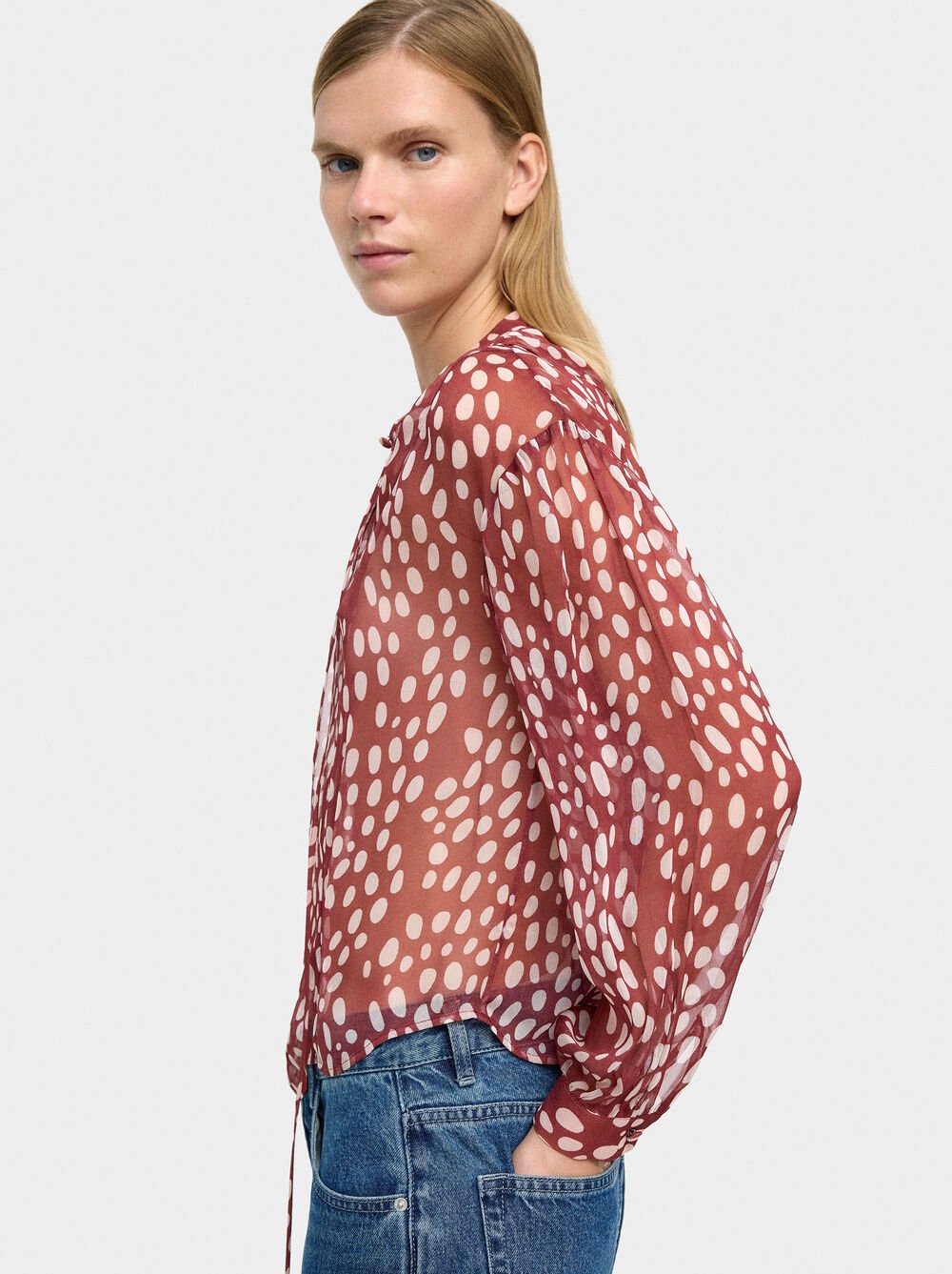 Blusa estampada semitransparente