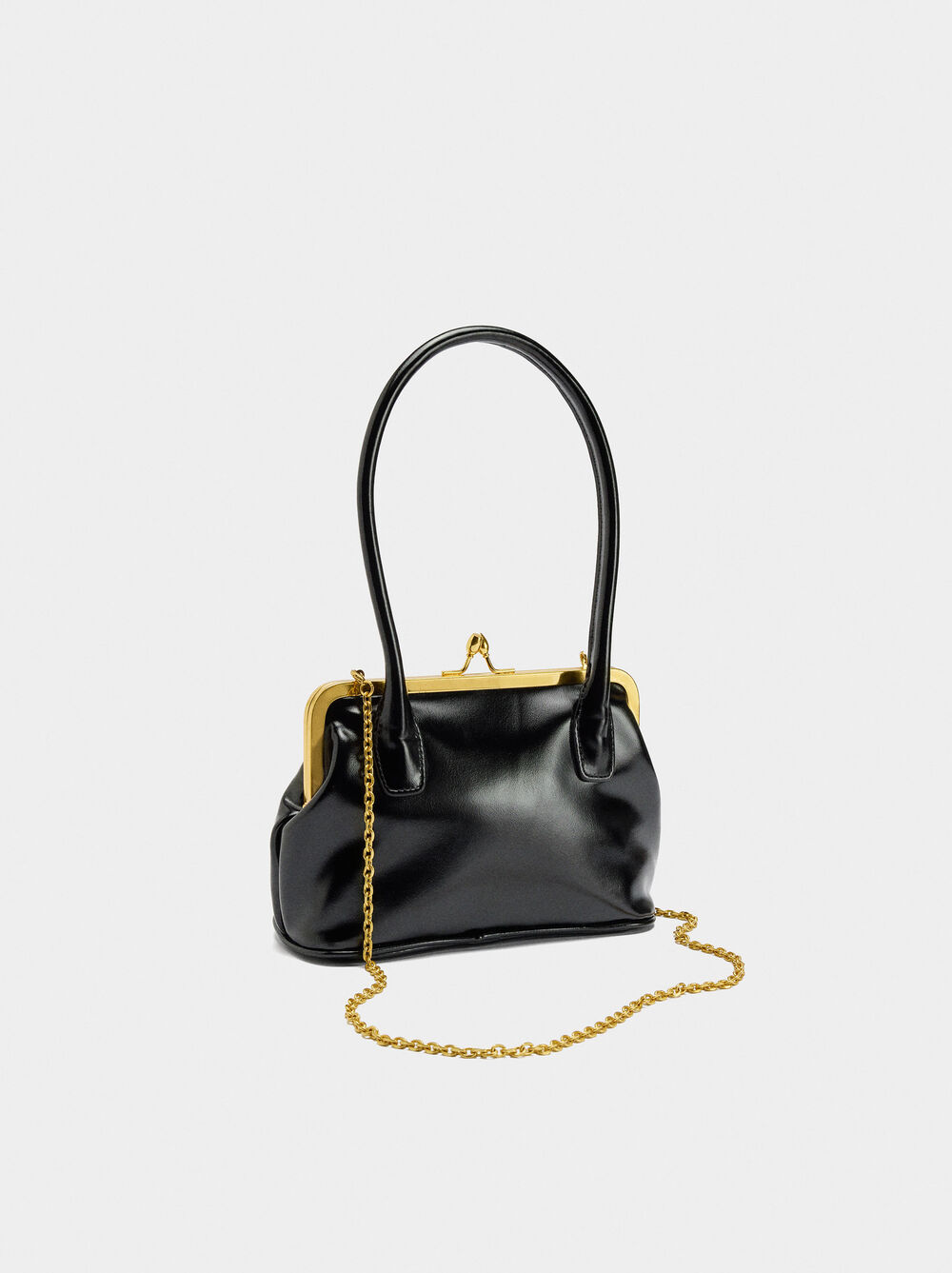 Party bag with kiss-lock closure