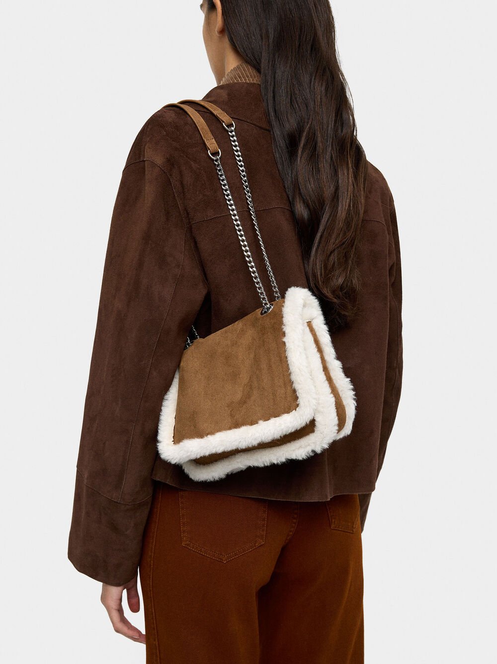 Shoulder bag with fur effect edges