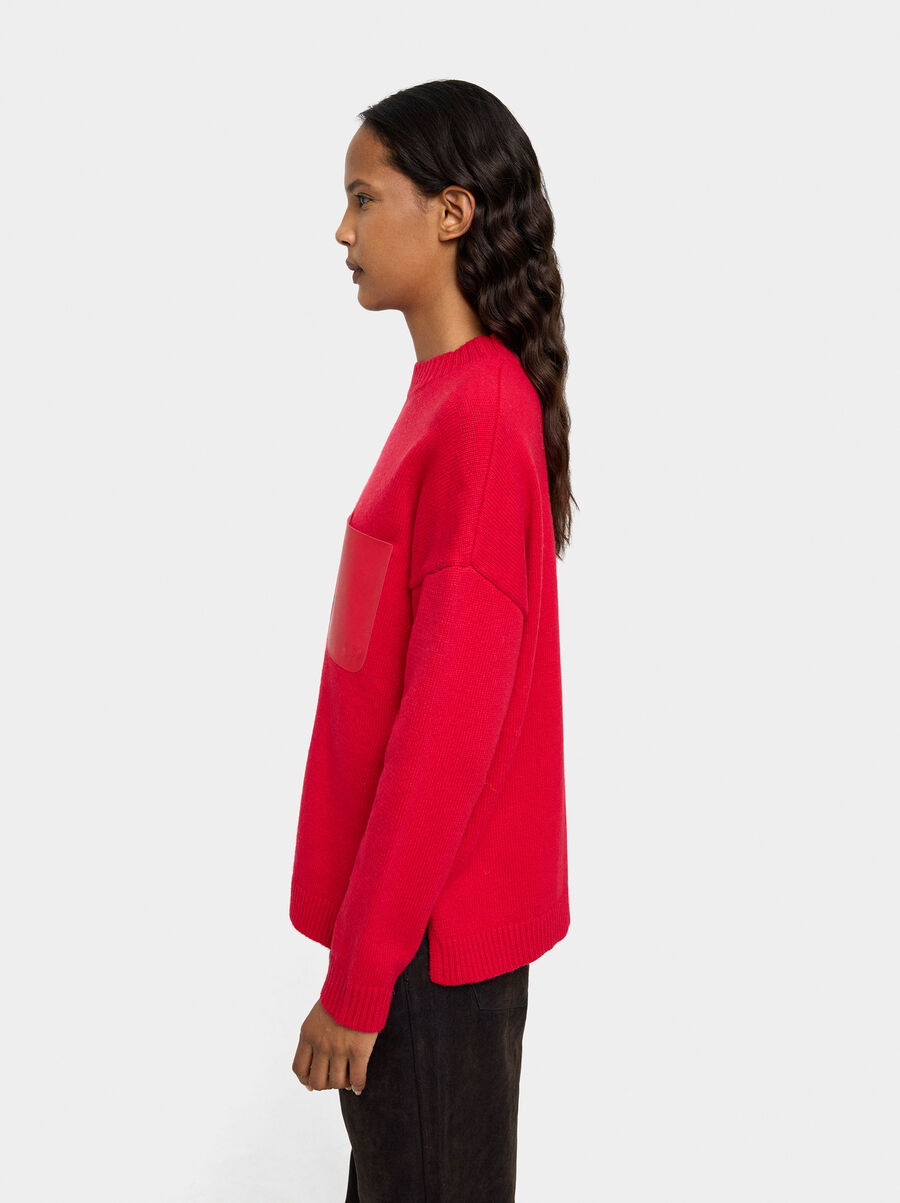 Jersey de punto con bolsillo efecto piel