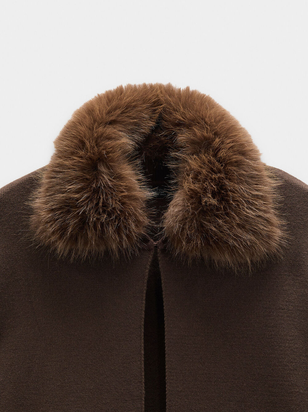 Knit poncho with fur-effect collar