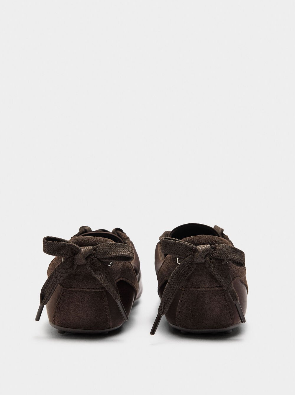 Sneakers with monochromatic leather details