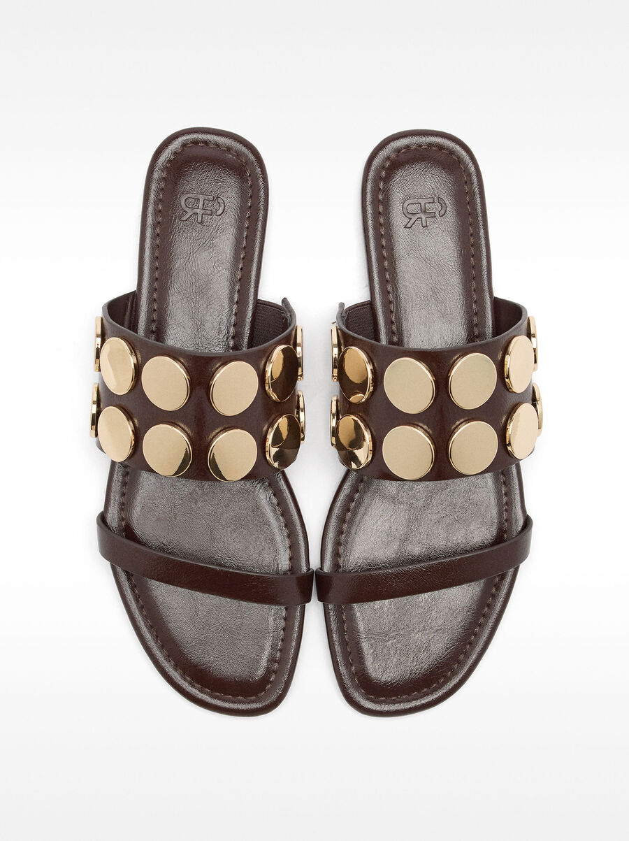 Flat sandals with metallic details