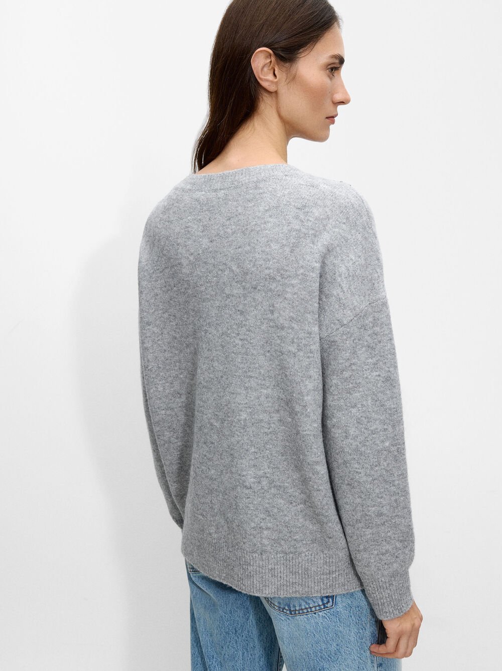 Sweater with wool blend and applications