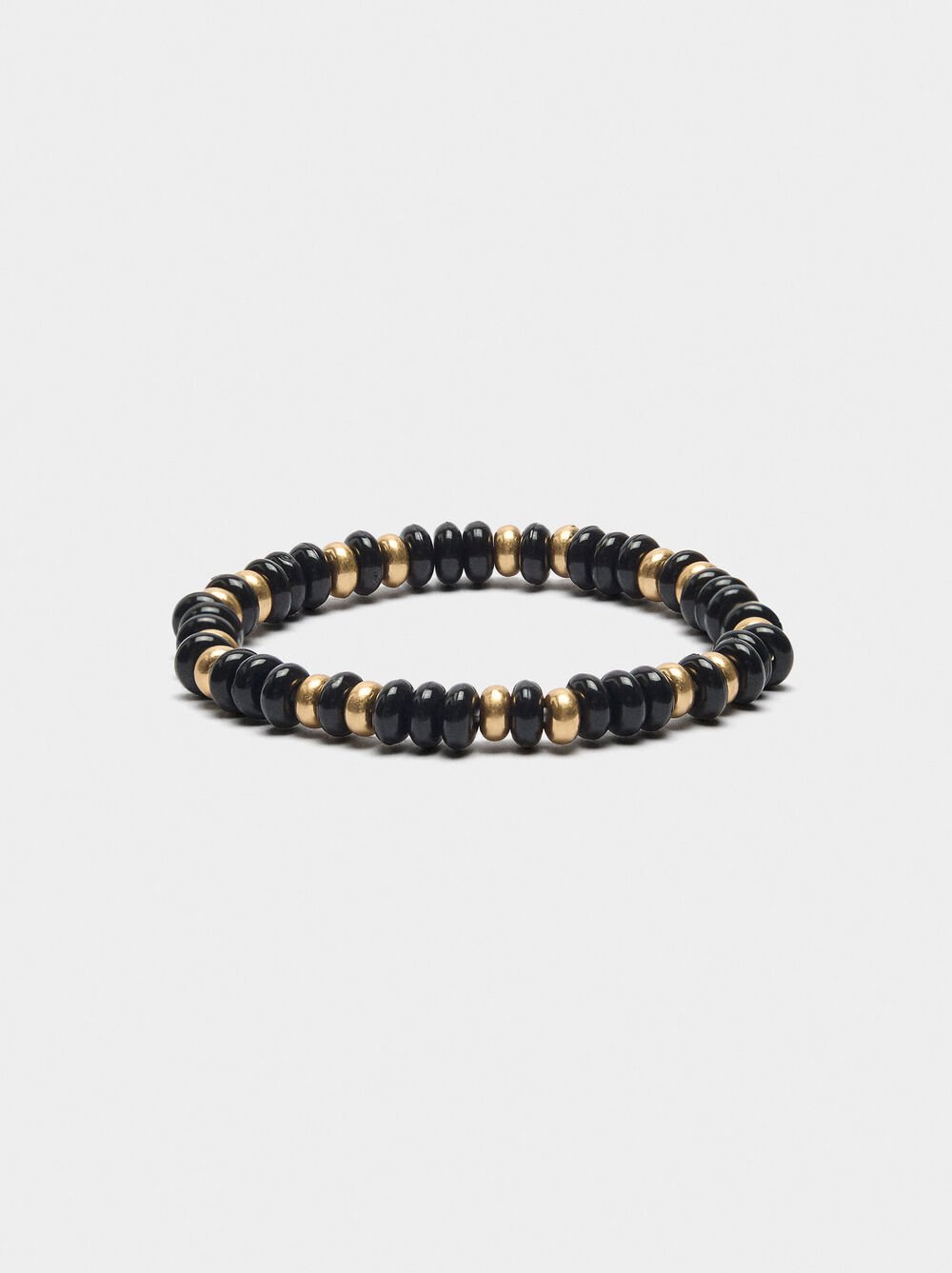 Pulsera elástica de cuentas bicolor