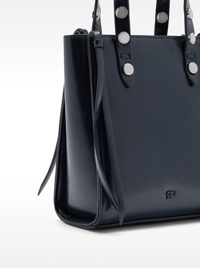 Bolso tote con tachuelas 