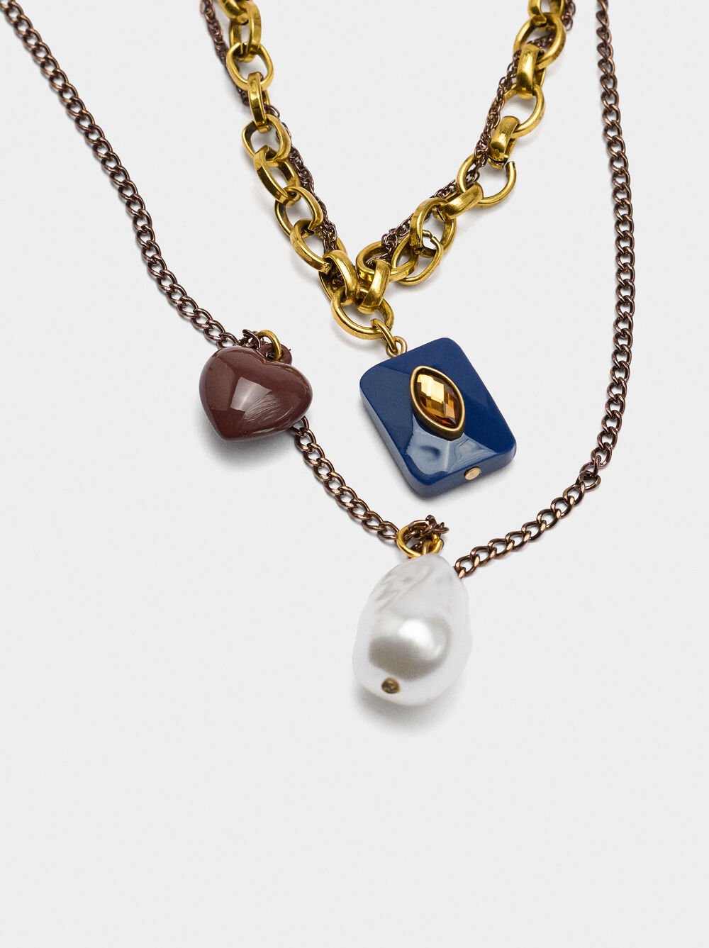 Set of necklaces with resin pendants