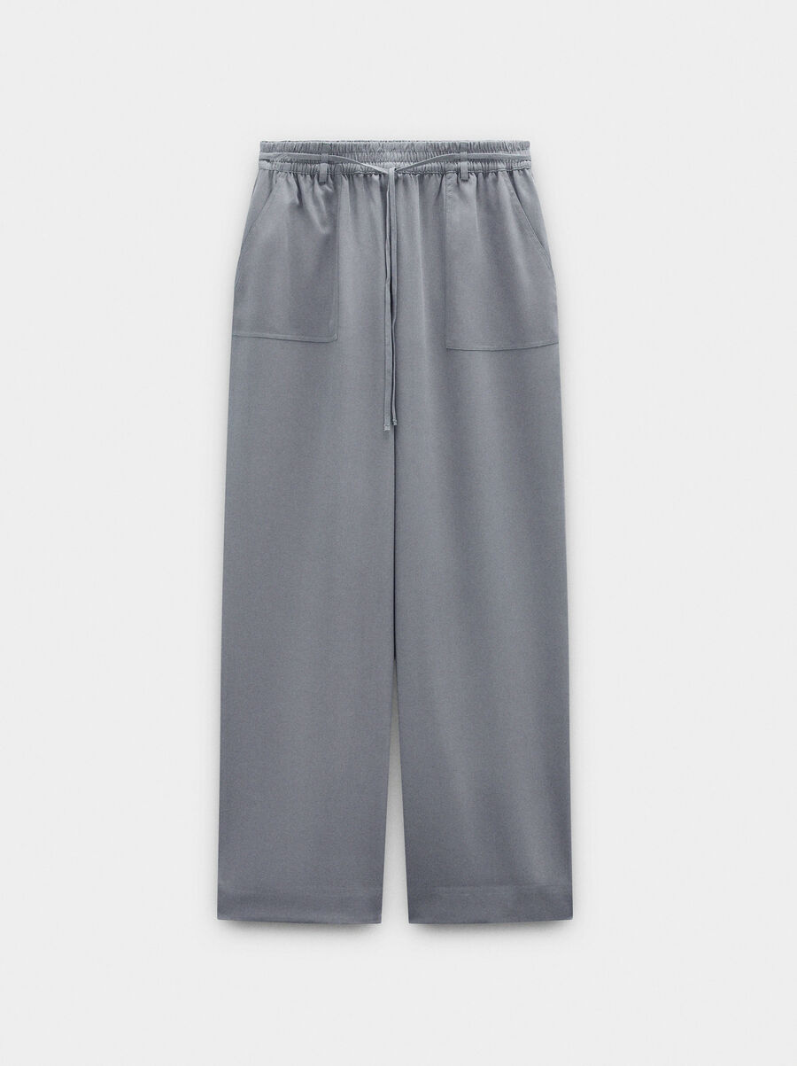 Elastic waist trousers with pockets