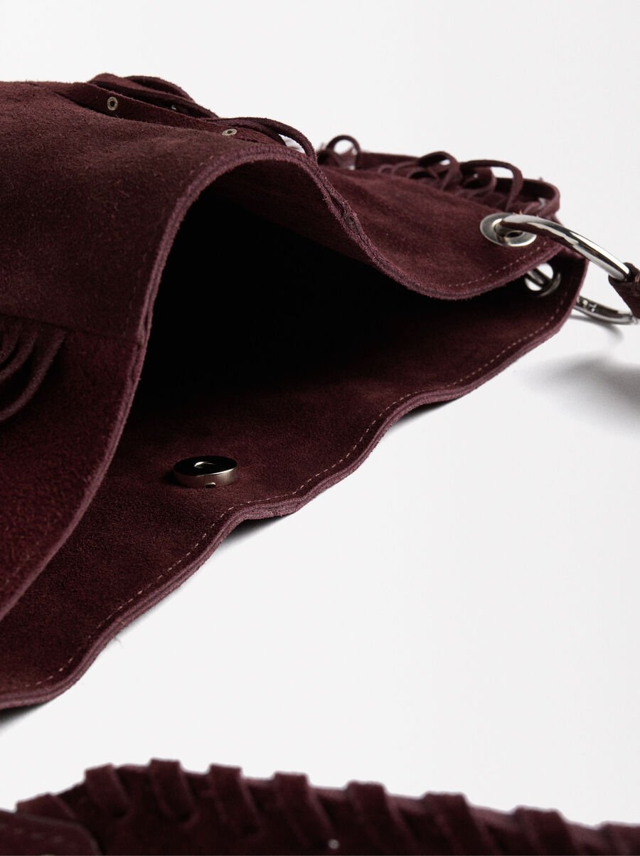 Leather shoulder bag with fringes