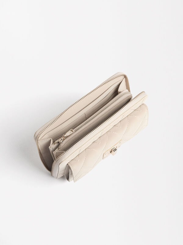 Quilted wallet with flap closure