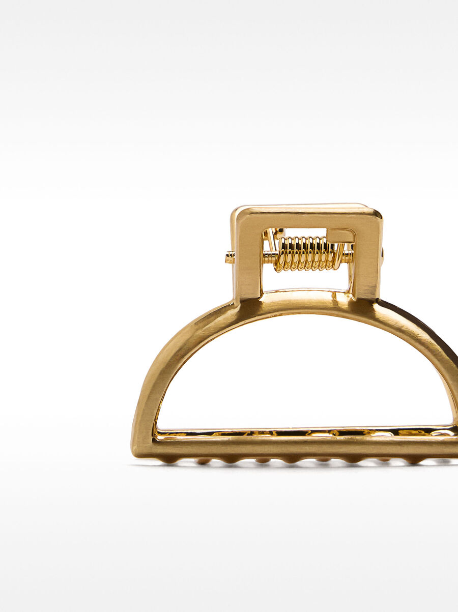 Goldene Haarspange