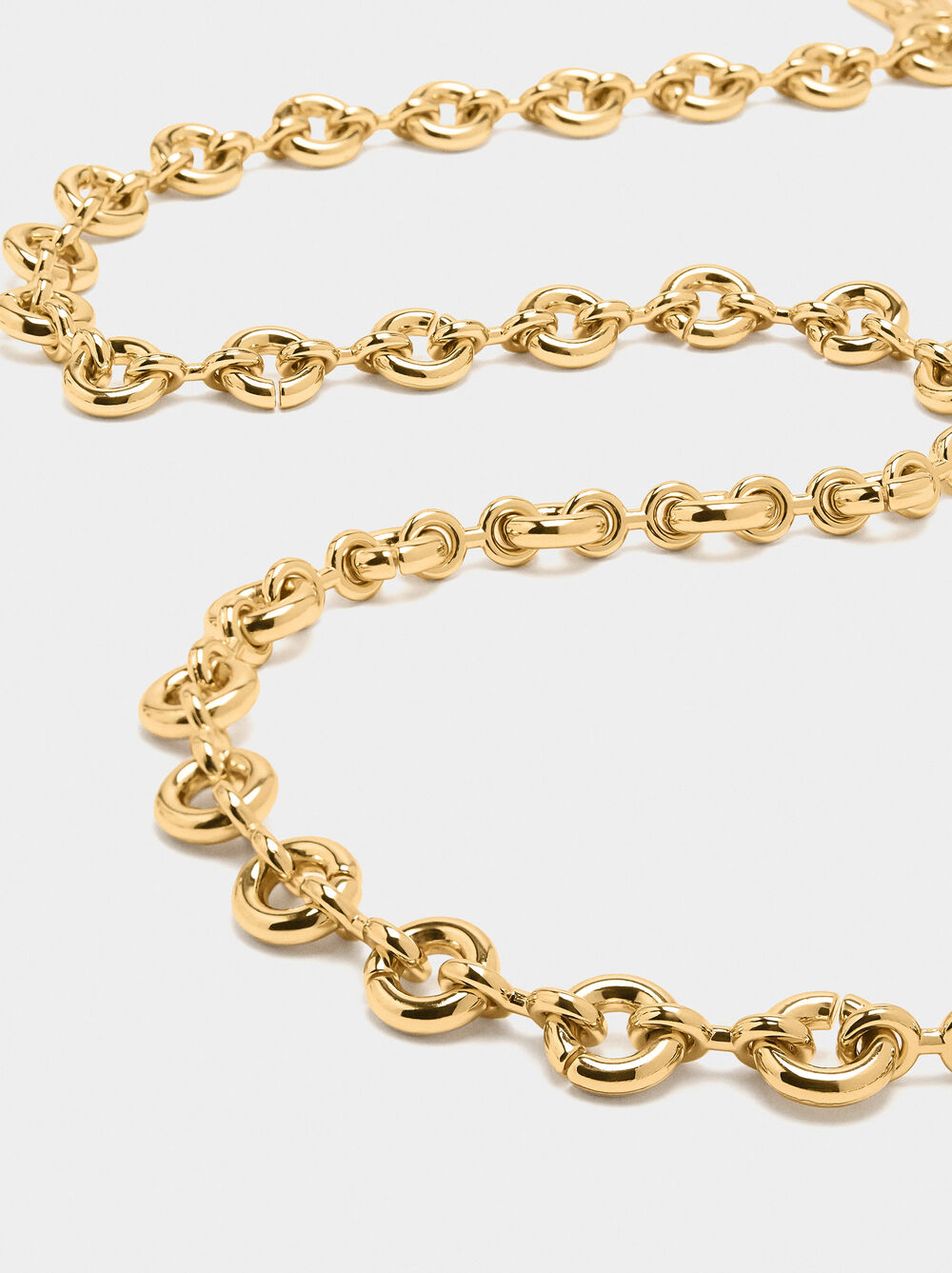 Metal belt with rings