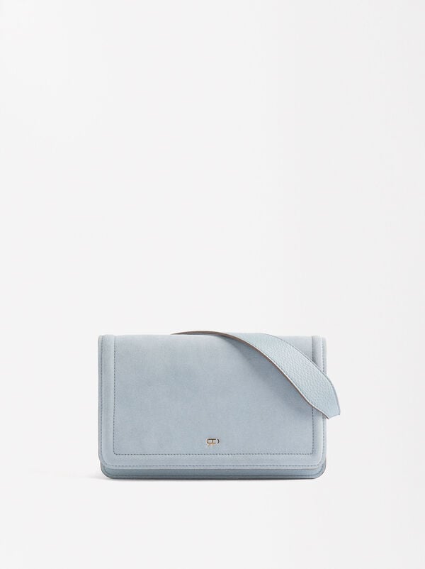 Shoulder bag with fur and flap closure