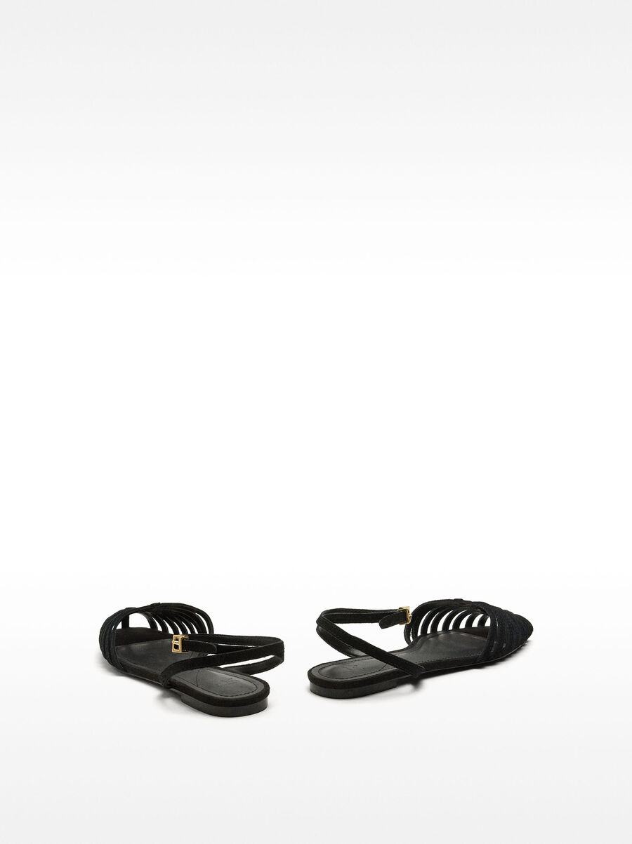 Flat leather sandals with straps