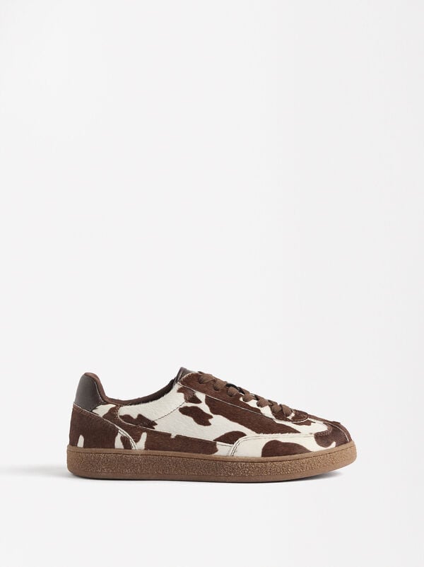 Animal print leather sneakers