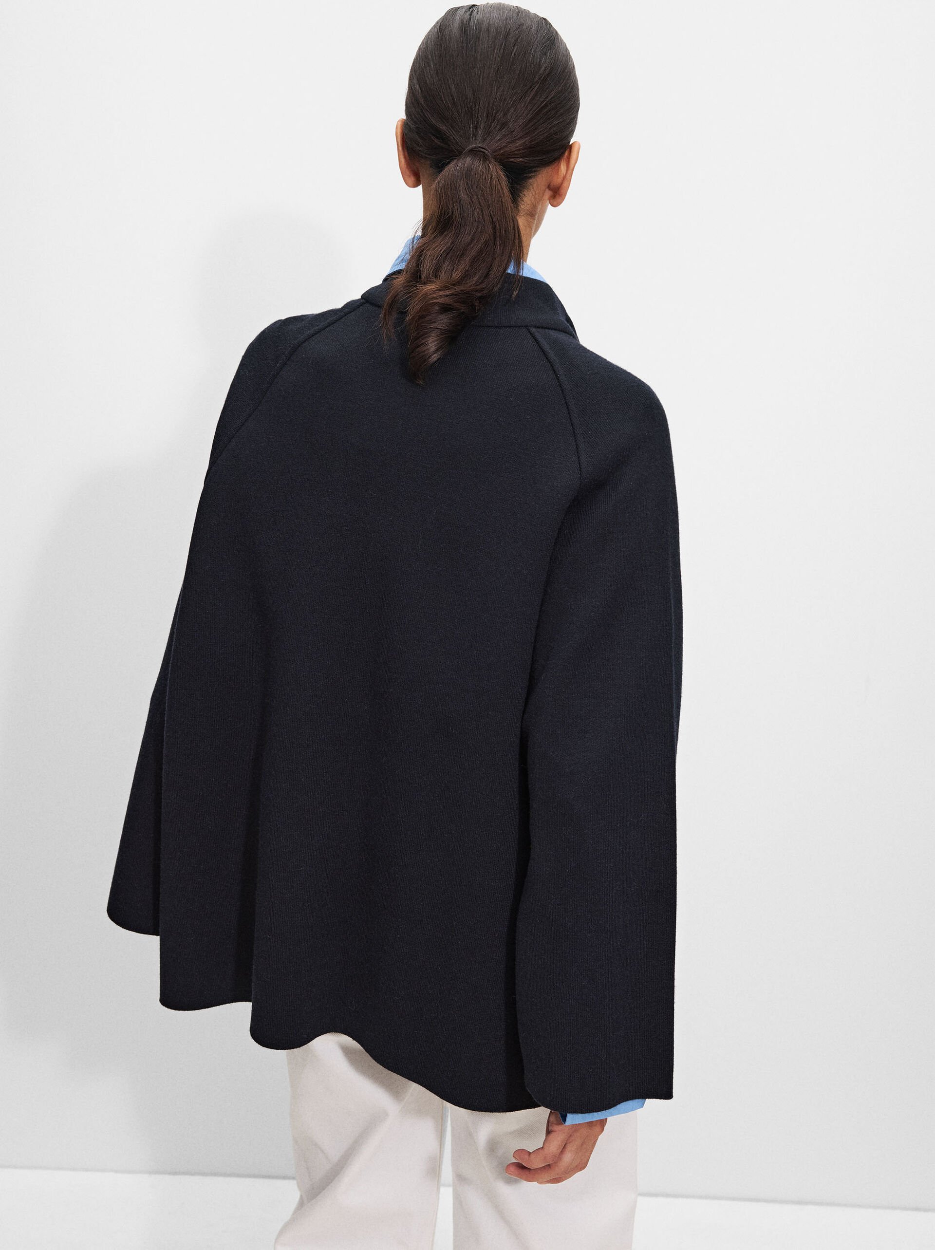 Knitted poncho with buttons image number 2.0