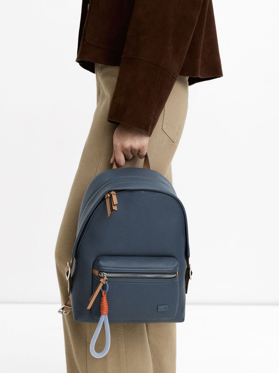 Textured backpack with pendant