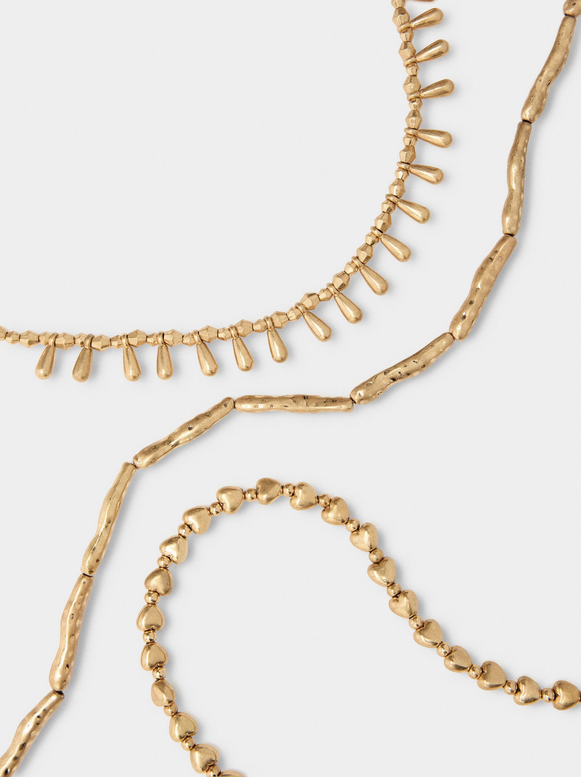 Set of short golden necklaces image number 2.0