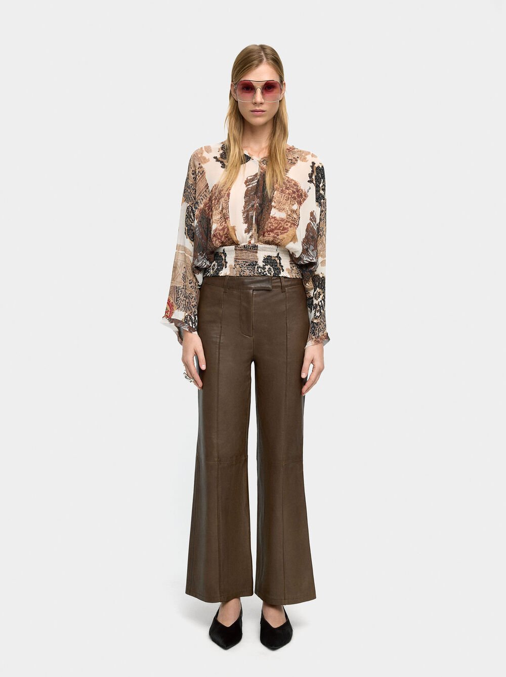 Blusa estampada semitransparente