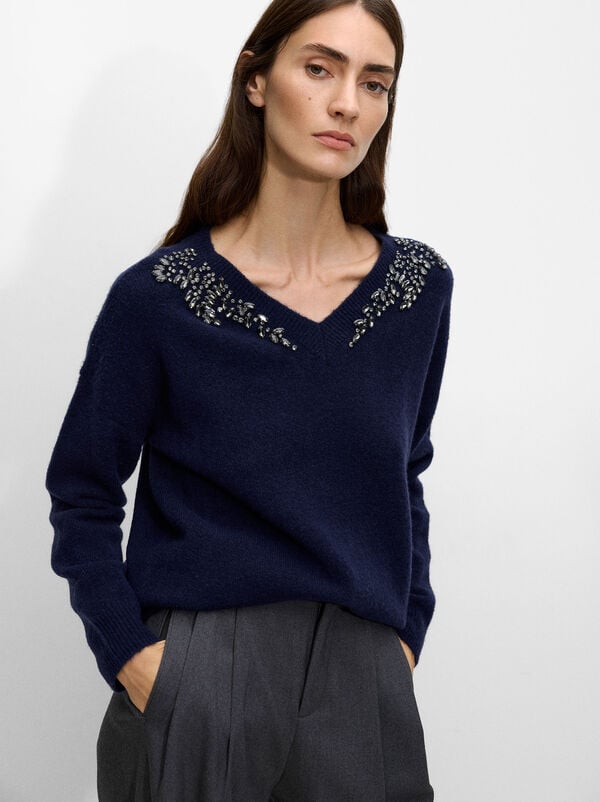 Sweater with wool blend and applications