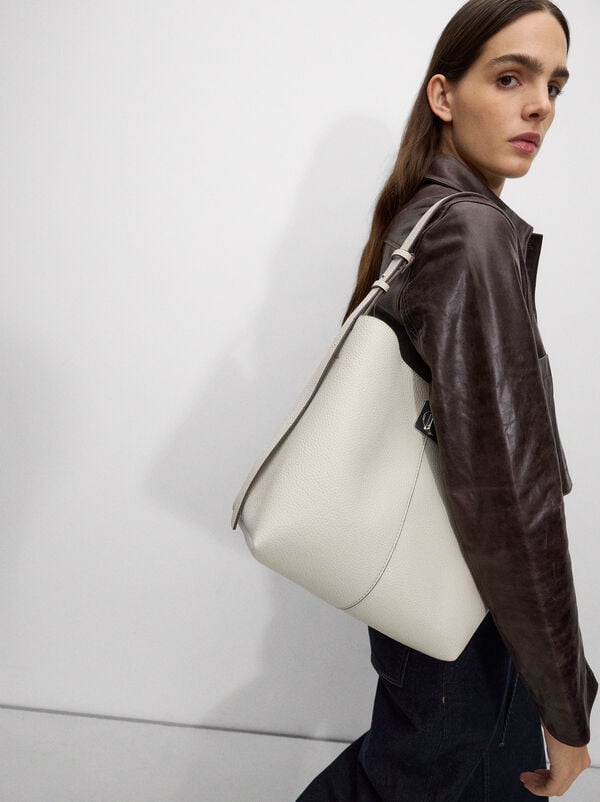 Shoulder bag with removable bag
