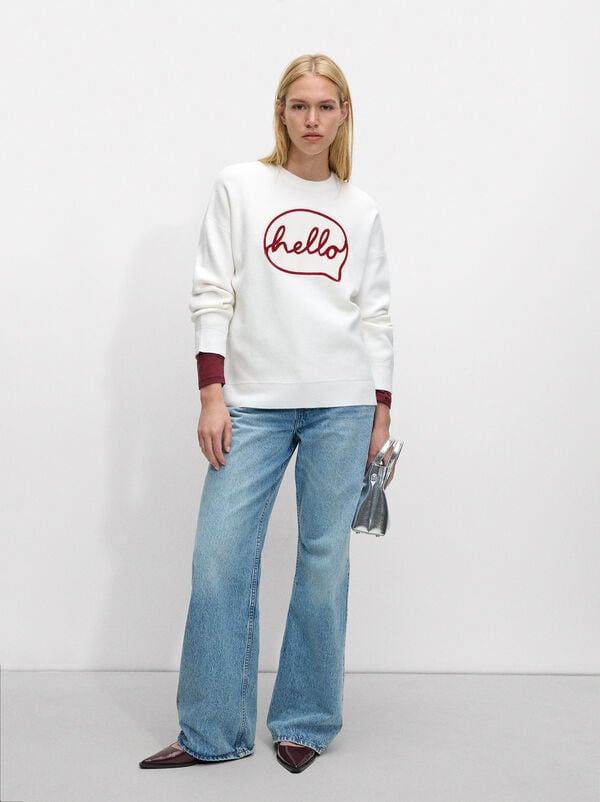 Knitted sweater with embroidery