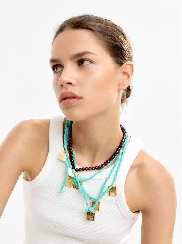 String necklace set with stone beads