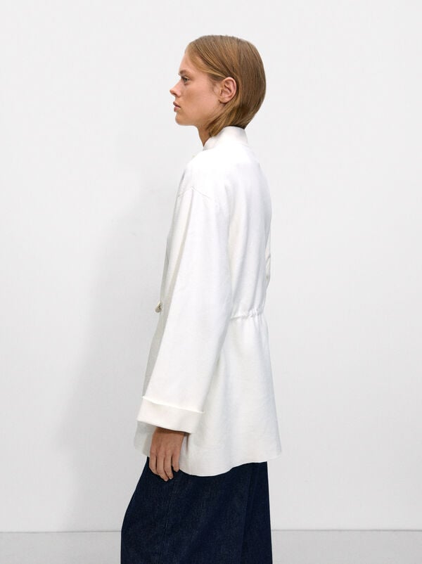 Knit cardigan with adjustable drawstrings