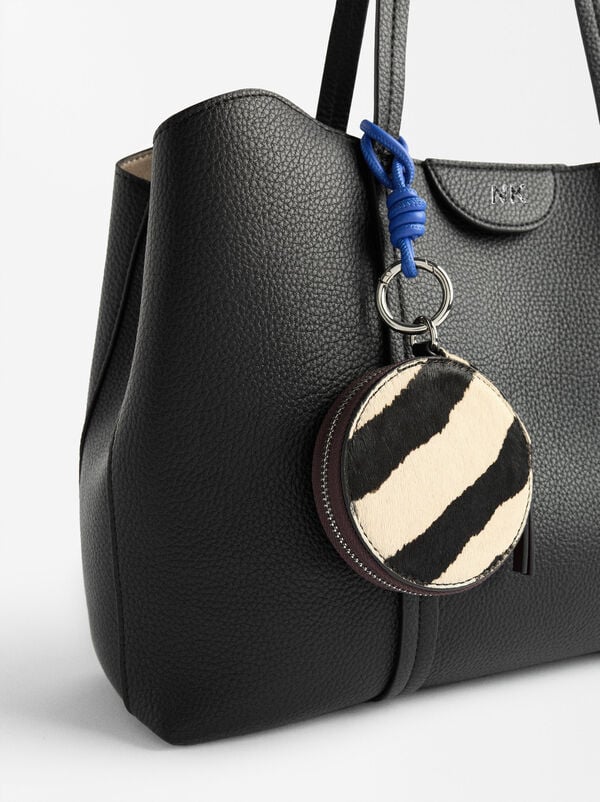 Laptop bag with leather pendant