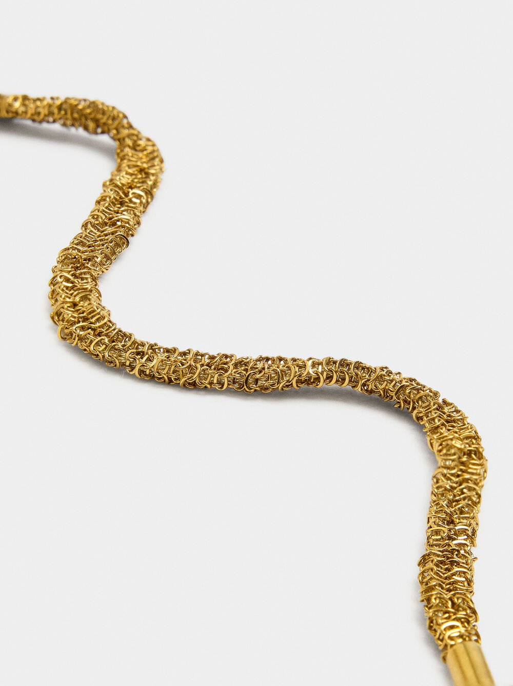 Tubular bracelet with intertwined chain