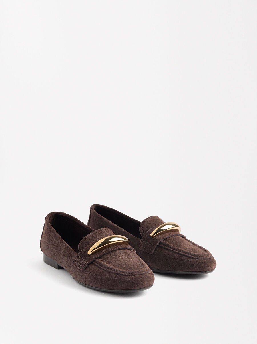 Leather moccasins with metallic detail