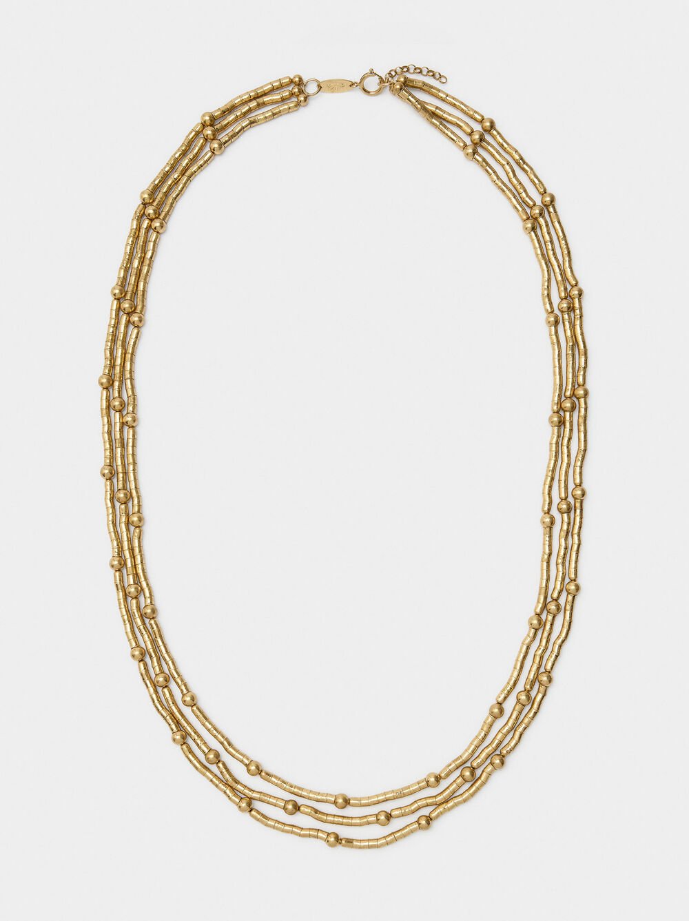 Flexible necklace with beads