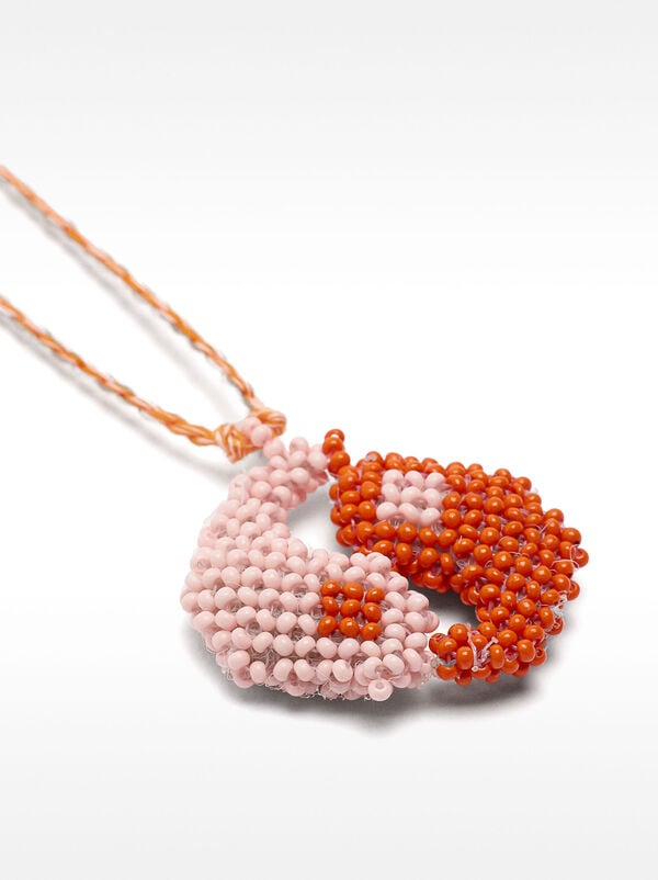Long necklace with beaded yin-yang