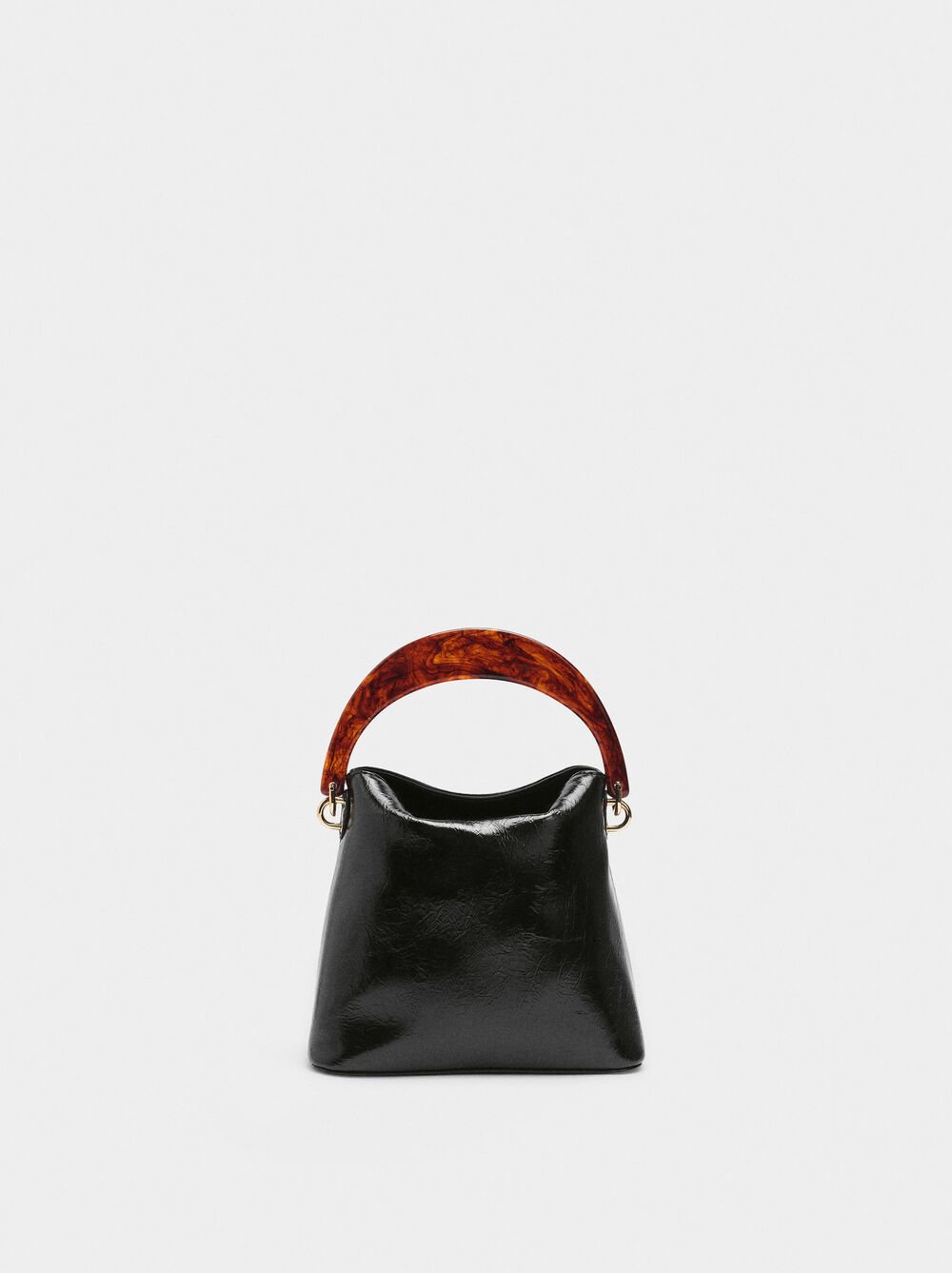Handbag with tortoiseshell-effect handle