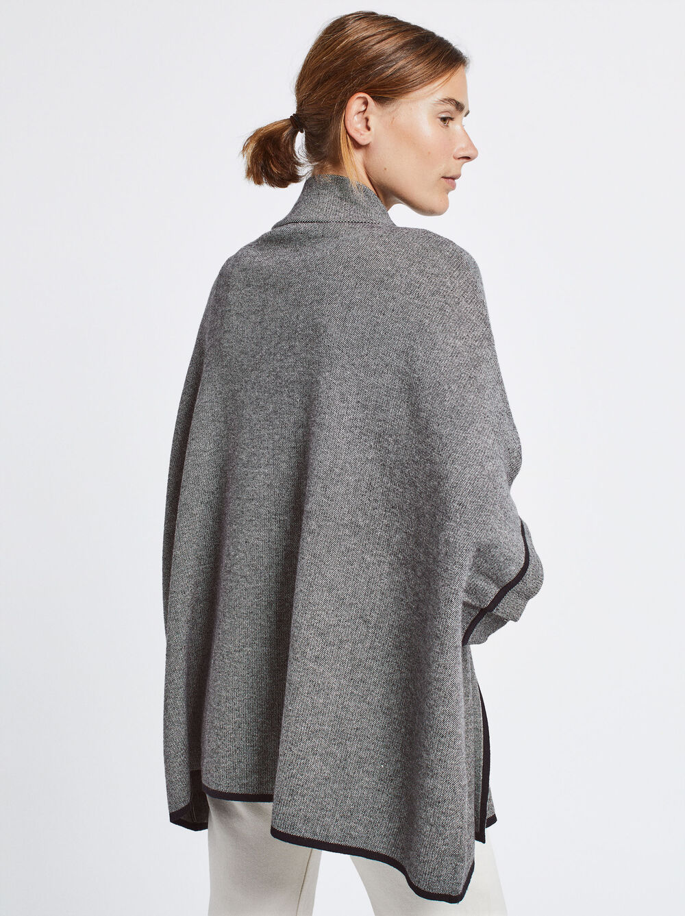 Knitted Poncho With Pockets