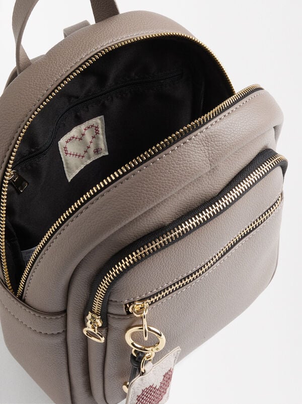 Backpack with heart pendant