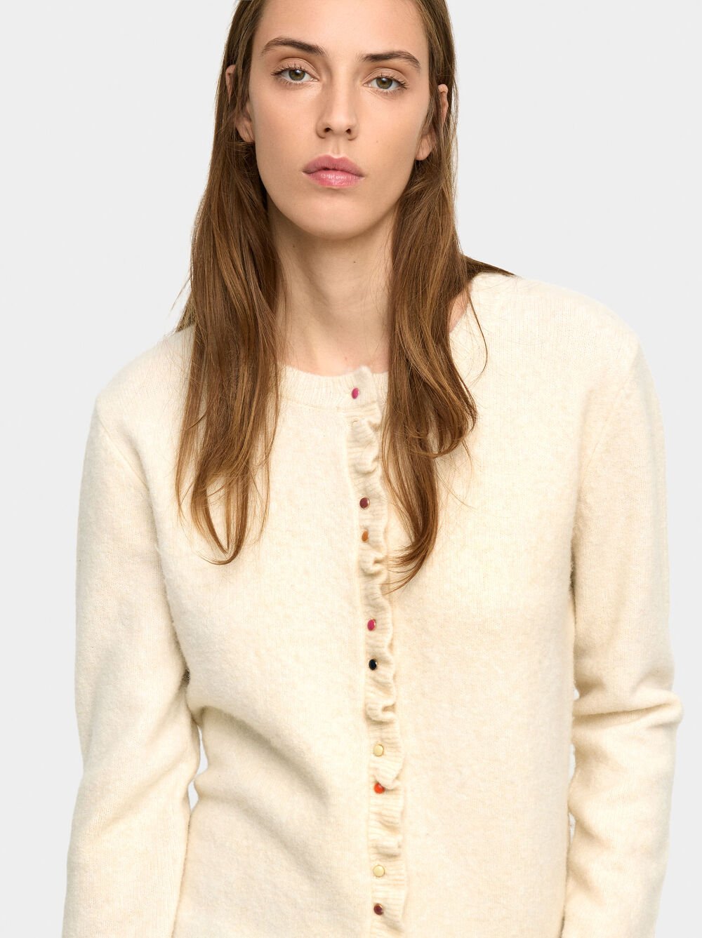 Knitted cardigan with ruffles